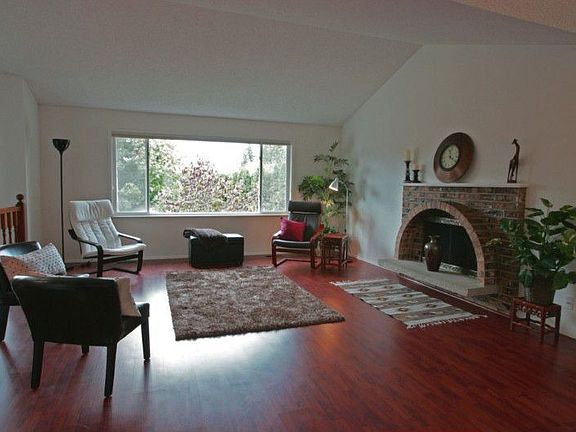 Living room has lots of natural light.