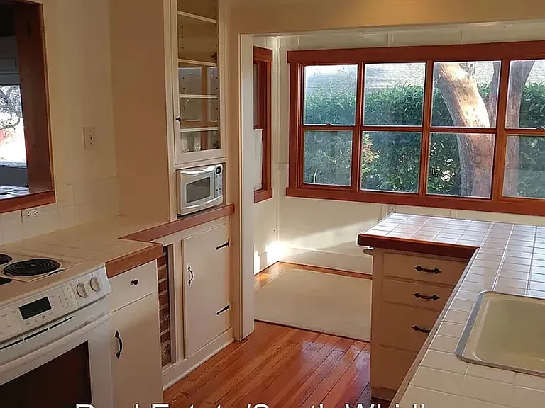 Kitchen looking into breakfast nook