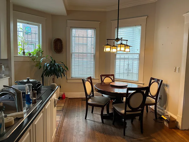 Dining room in between living room and kitchen