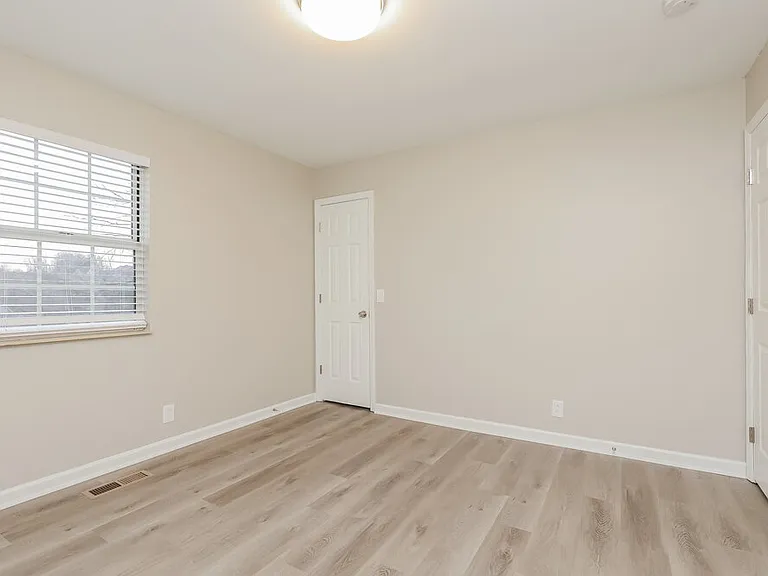 1409 Woodchimes Ct — Photo 13