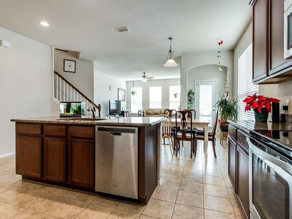 Kitchen overlooks into the bright living room