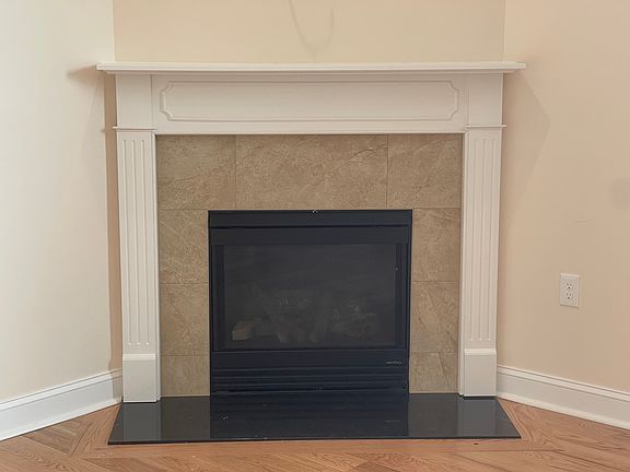 Gas Log Fireplace with remote is begging for decorating