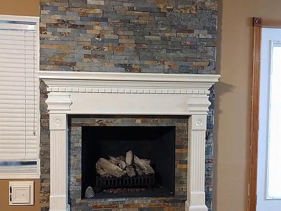 stone surround fireplace