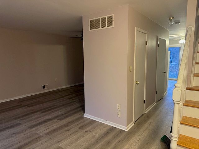 Entrance to living/dining rooms and hallway to kitchen and half bath.