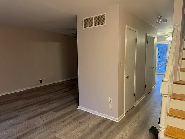 Entrance to living/dining rooms and hallway to kitchen and half bath.