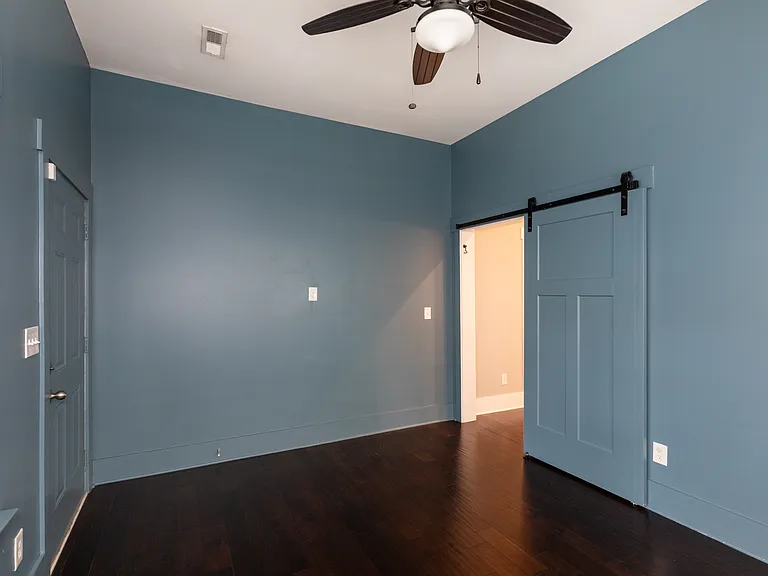 Sun room with barn door