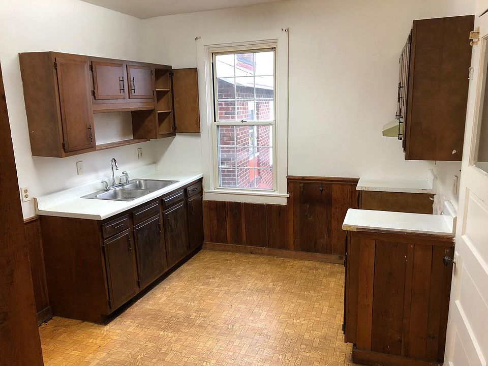 Kitchen with large pantry on right
