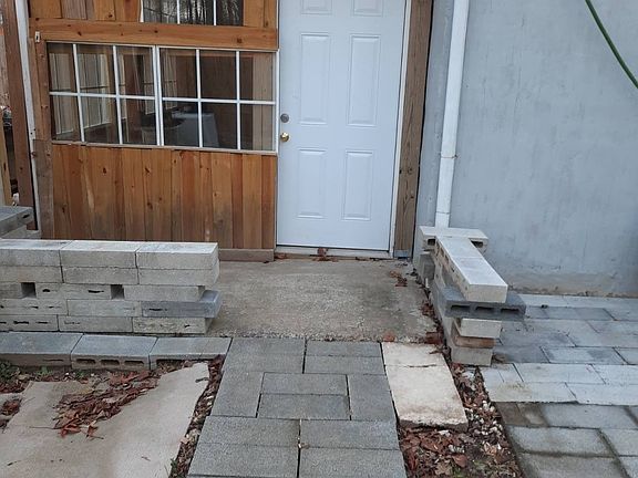 Door of sunroom with walkway