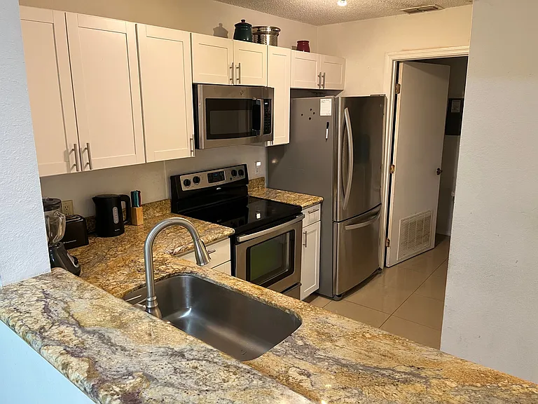 Kitchen. Door leads to laundry room.