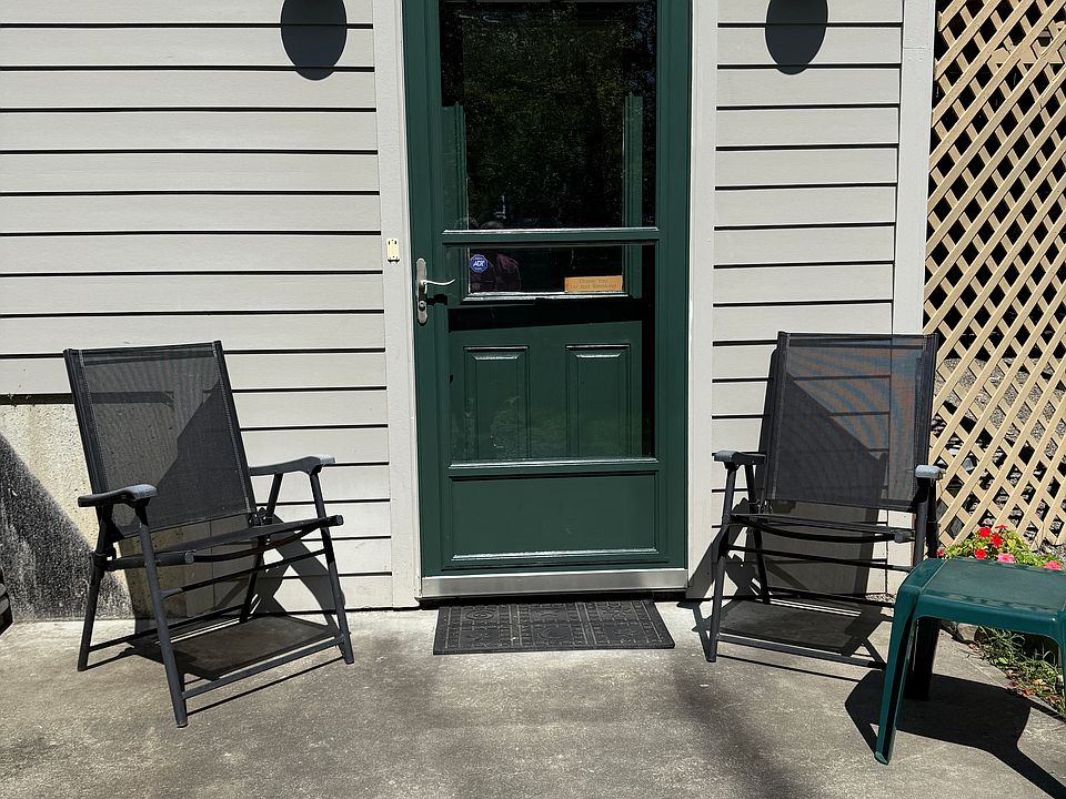 Private front entrance with patio for relaxing in the sun.