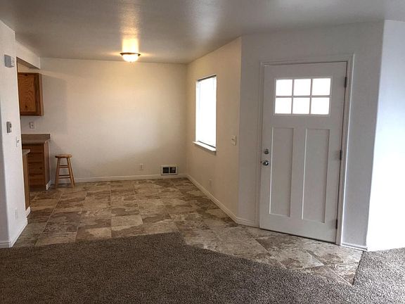 Tiled Entry, Kitchen & Dining Area