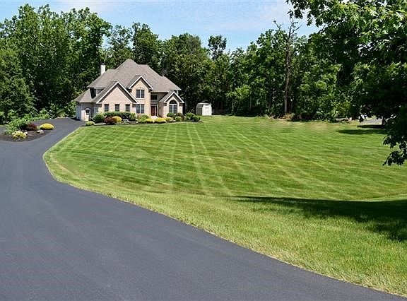 Generous set back provides privacy yet still within the sought after neighborhood of Four Season Estates.