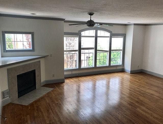Living room with lots of light and fire place