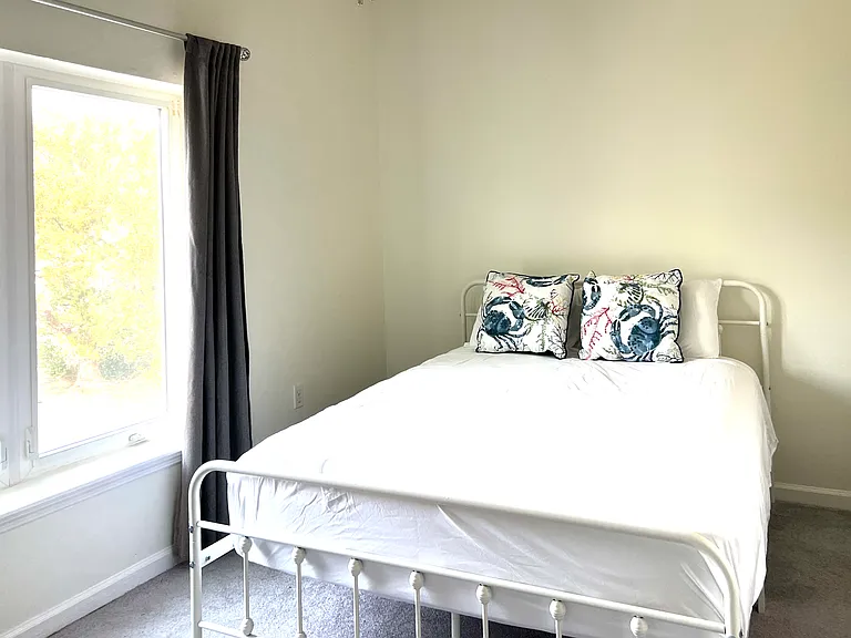 Light filled 3 #rd Bedroom on main floor. Queen bed. Full Bath across the hall