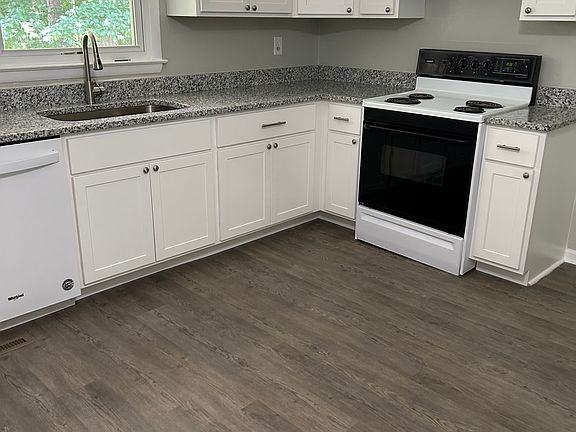 beautiful Kitchen with lots of cabinets and a pantry