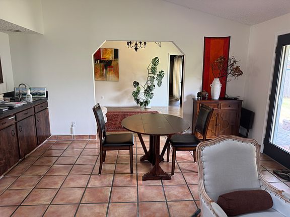 Sweet space for dining for one or two people. There is a larger dining table if that is what you need.