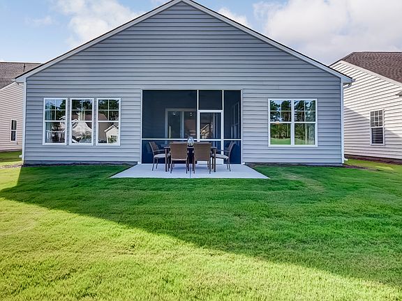 Spacious backyard with patio