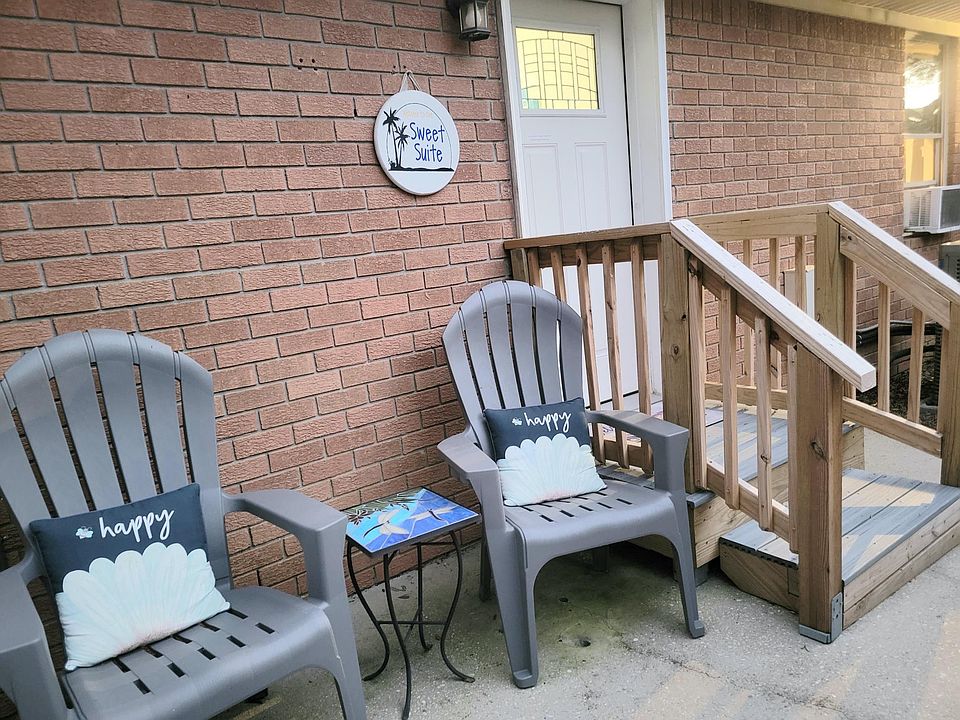 Your suite's private entrance and sitting area which also has a small gas grill.