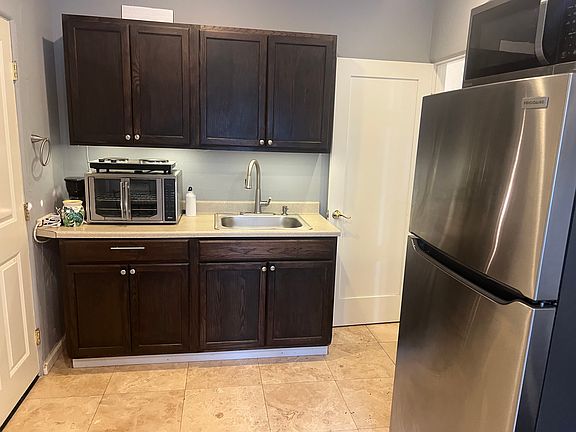 Door 2 to the left in this picture. Exits to laundry area and pool