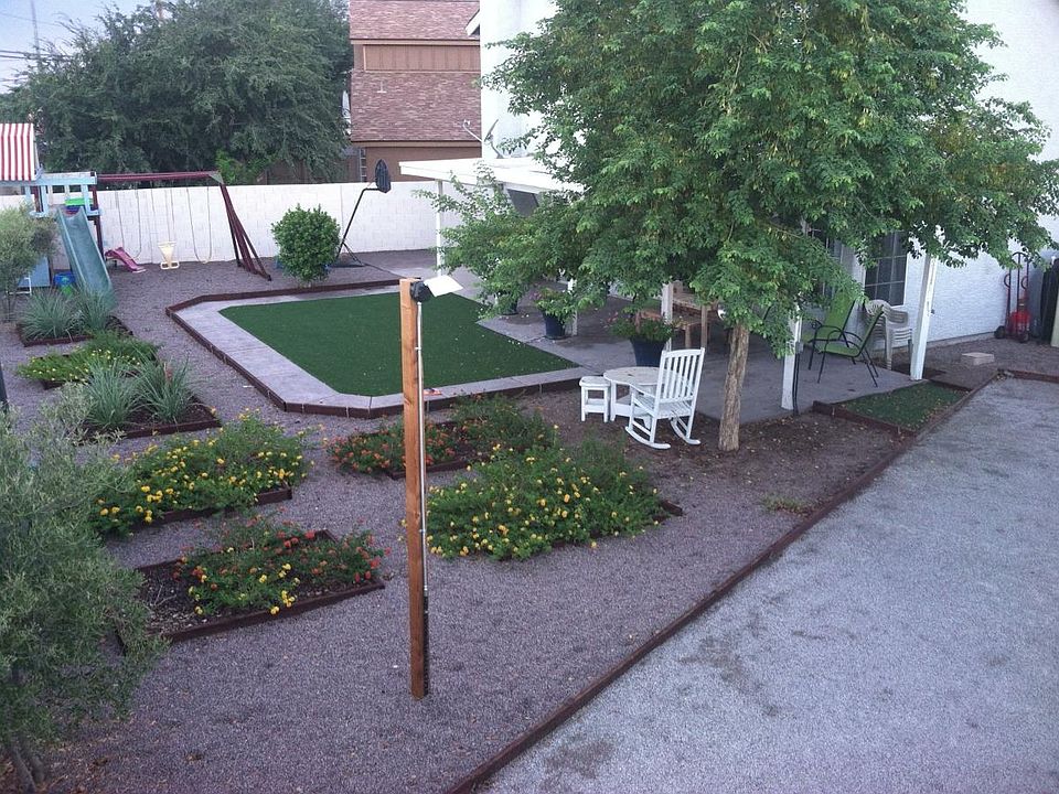 Lighted bocce court in backyard