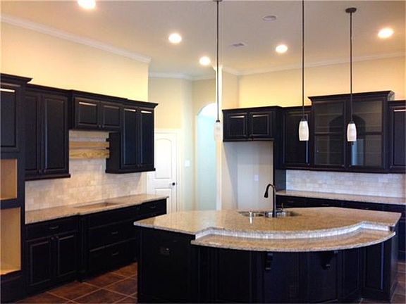 Beautiful kitchen with granite counter top and Stainless steel appliances are included