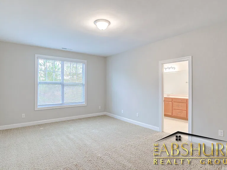 Oversized Owner's retreat with dual walk in closets