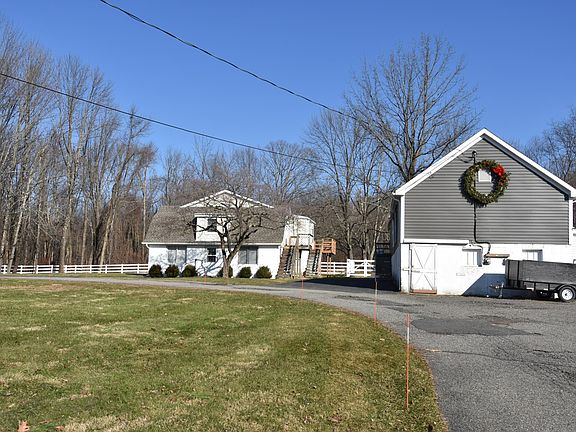 VIEW FROM THE BACK WITH DRIVEWAY