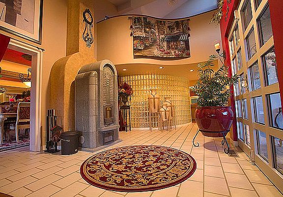 Foyer with Tulikvi wood stov