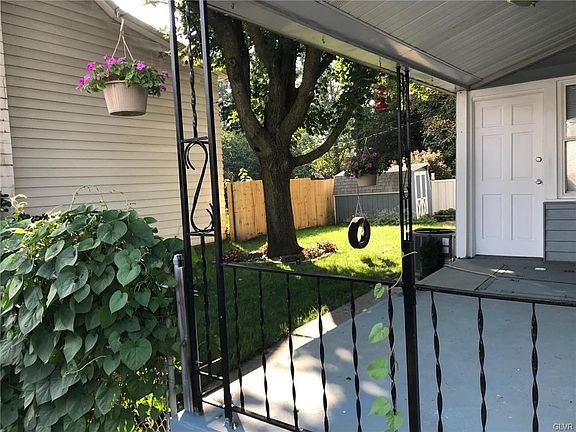 Delightful View of Side Porch and Side Yard!
