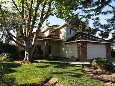 Commanding view with great curb appeal. Call me for a tour.