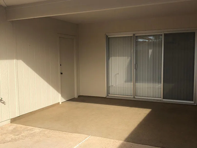 Covered patio with door to garage