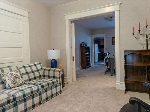 Inviting Living Room Opens to Dining Room!