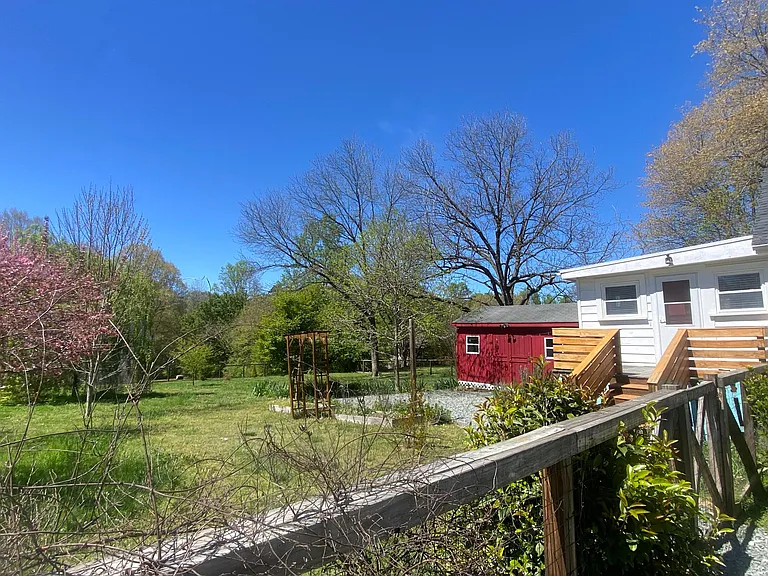 back yard with wired out building