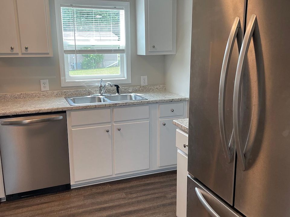 Kitchen with stainless steel appliances and solid wood cabinetry. Not mobile home cabinetry.