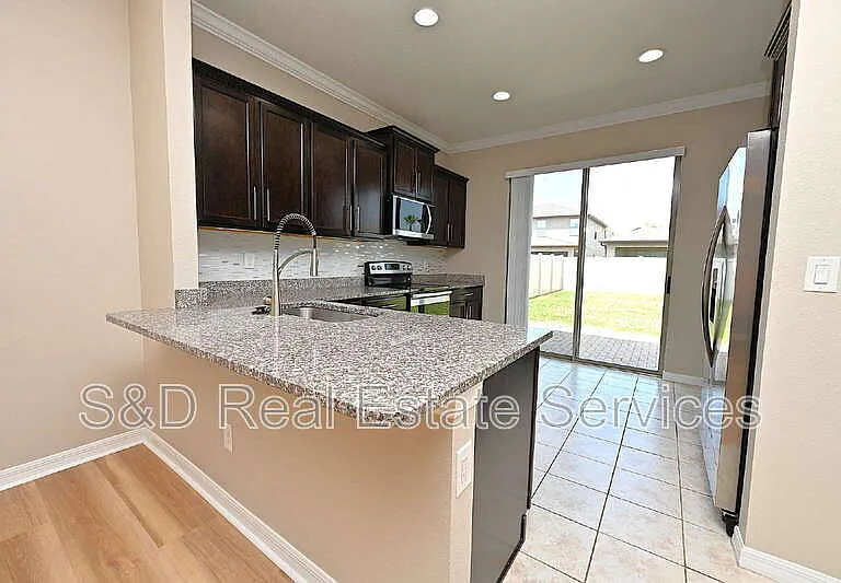 6309 Yellow Buckeye Dr — Photo 3