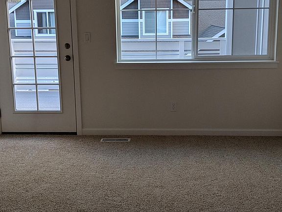 Master suite with 5 piece bathroom, walk-in closet, and access to deck.