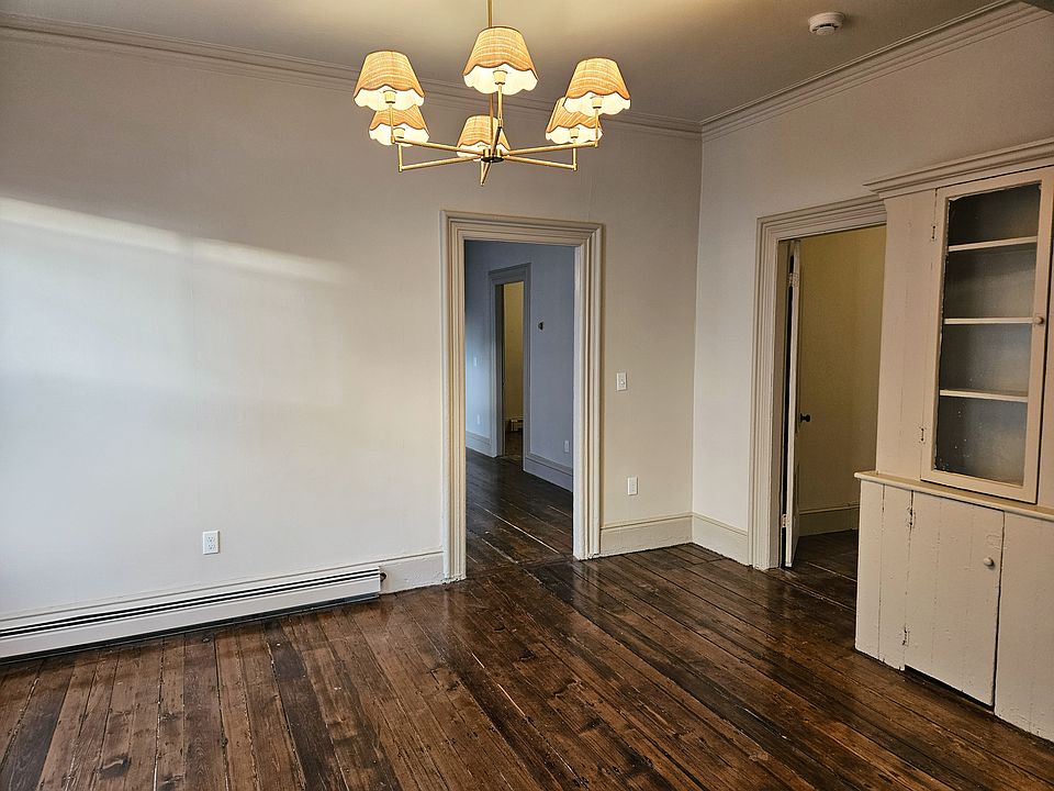 Sweet dining area with original built-in cabinetry