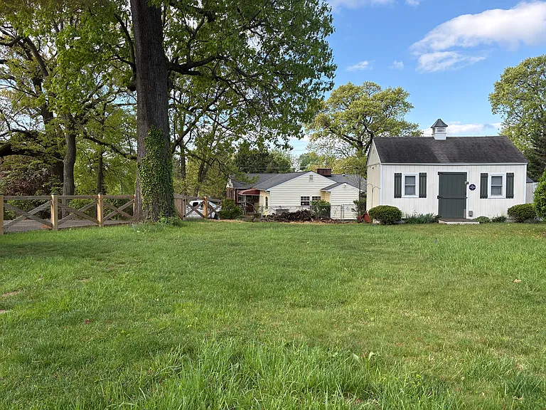 Spacious private rear yard with large shed