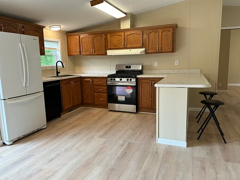 Kitchen area with all new appliances
