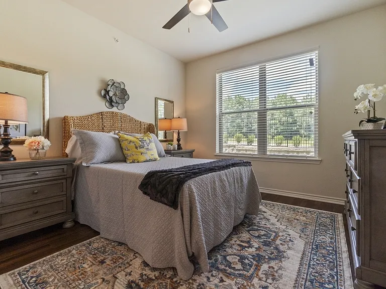 Comfortable and inviting bedrooms designed for restful living in Tyler, Texas.