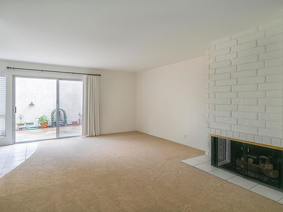 Living room with view to patio

