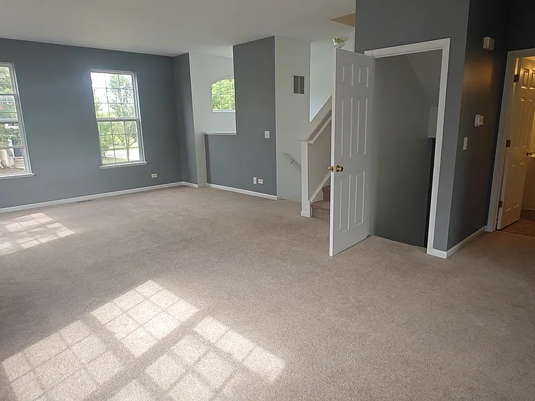 Living room looking into the half bath