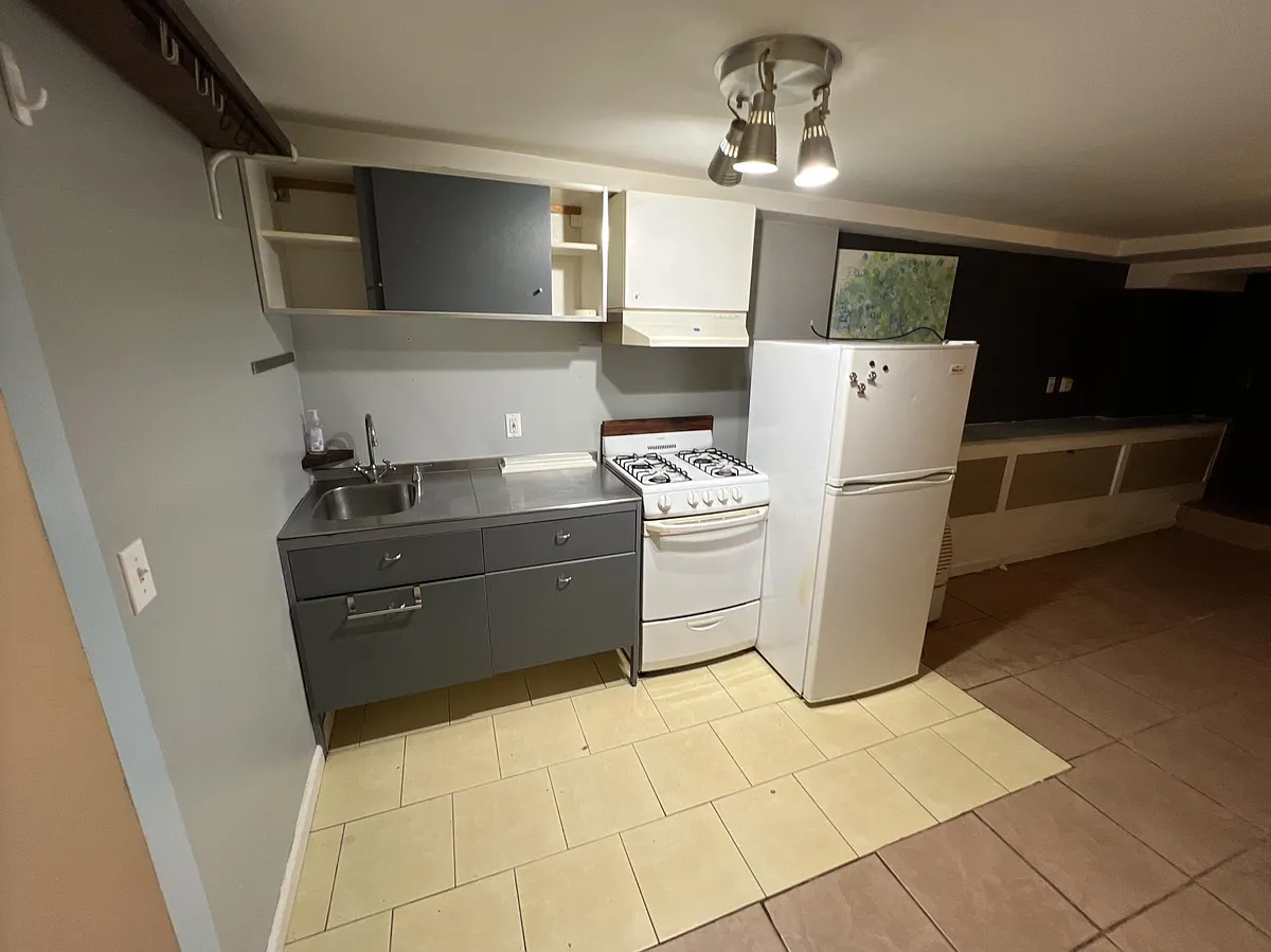 Kitchenette next to living room area. - 629 Madrid St #B