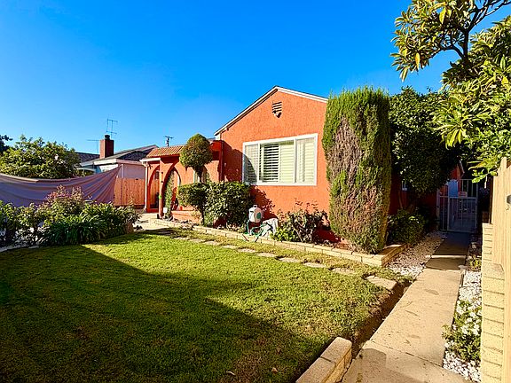 Fully gated property with secure pedestrian entrance and privacy fencing.