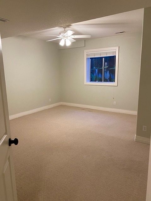 Spacious bedroom with natural light, 8 ft ceilings