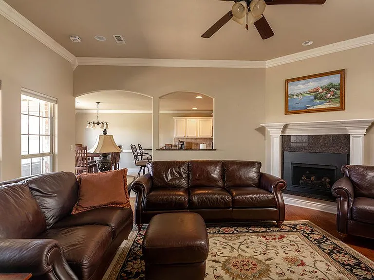 Living room with gas fireplace.
