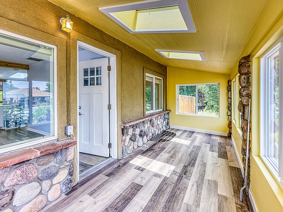 Beautiful new 3-season sunporch with two bright skylights