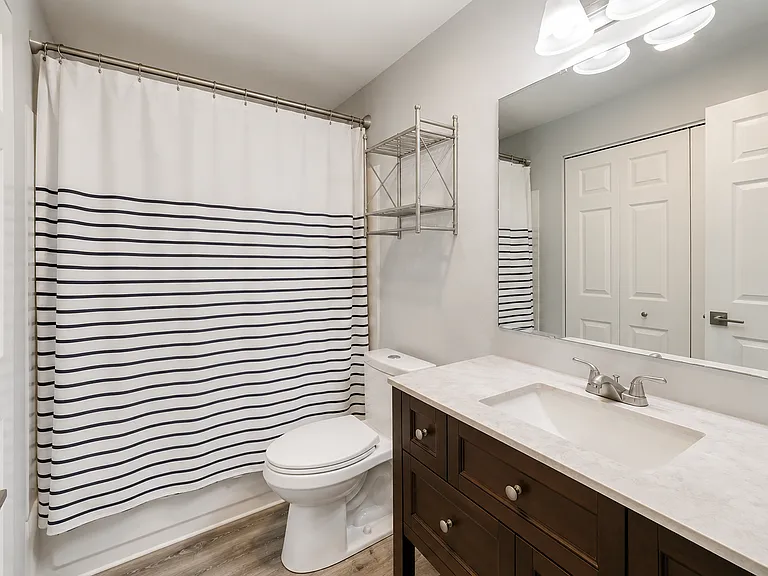 Full Bathroom. Your washer/dryer is behind the door.