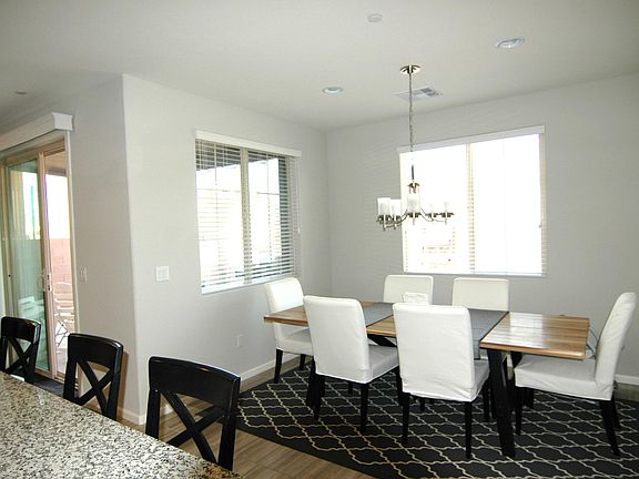 Beautiful dining area, with 2 large windows to backyard - no