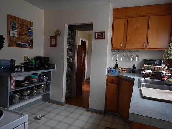 Kitchen with new fridge and pantry